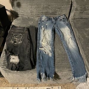 Distressed Blue and Black Jeans